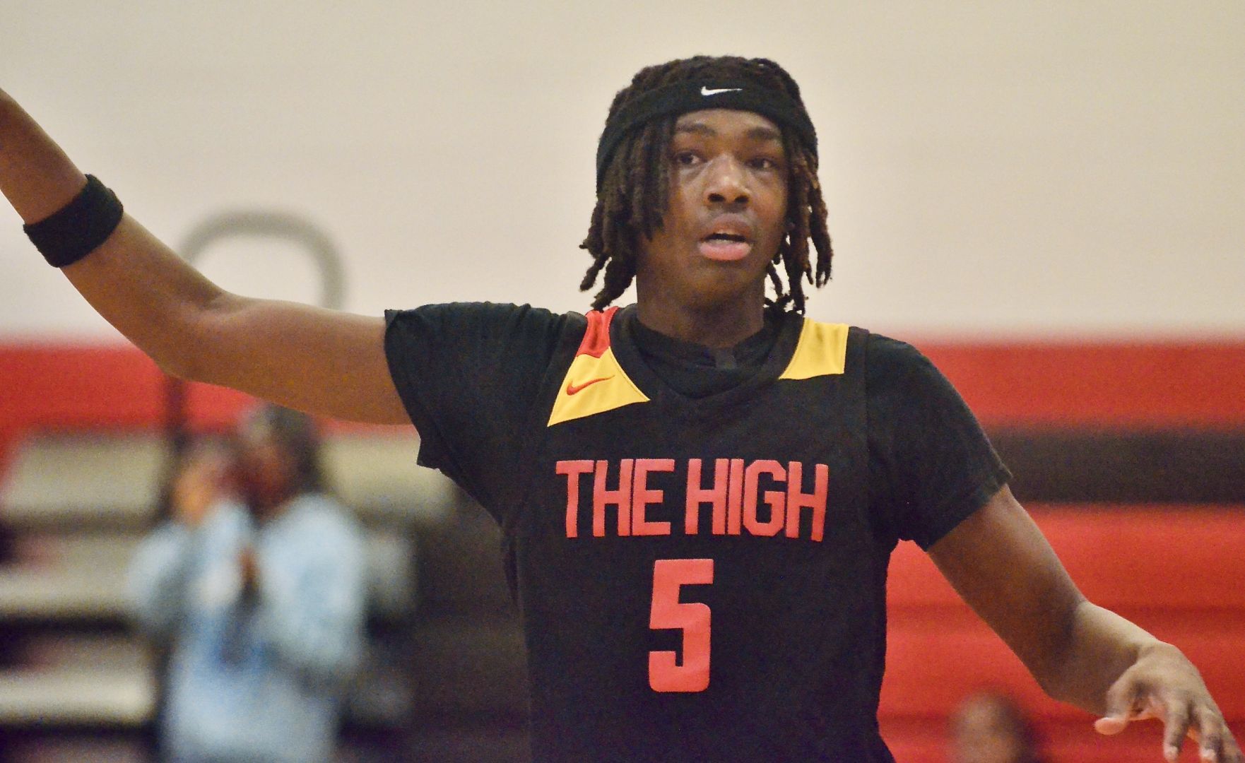 Trenton High’s Aivaye Ingram gestures to his team against Ewing...